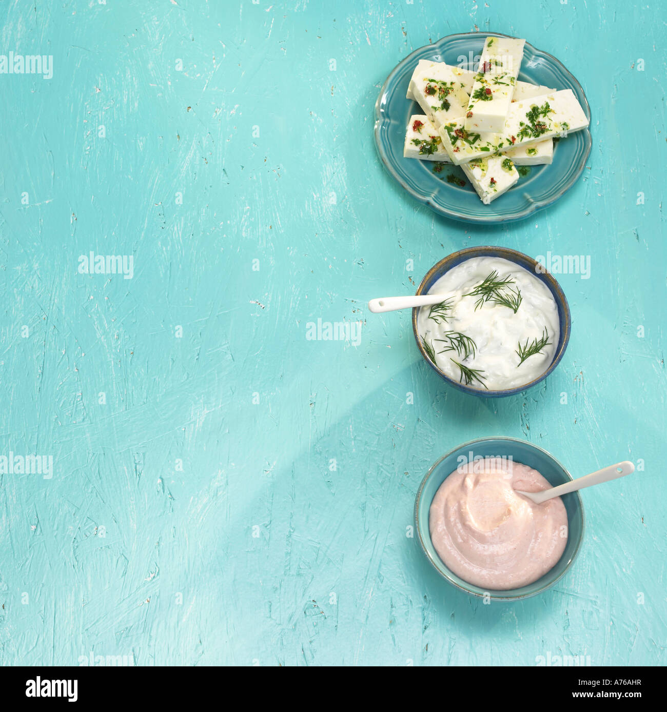 Greek starters in bowls, feta cheese, tsatsiki and taramas Stock Photo Alamy