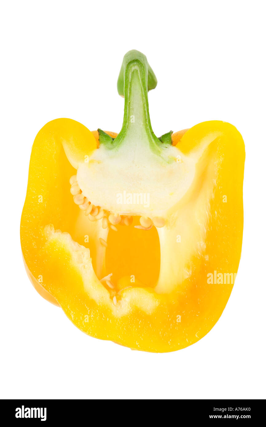 Half a yellow bell pepper on a pure white background. Stock Photo