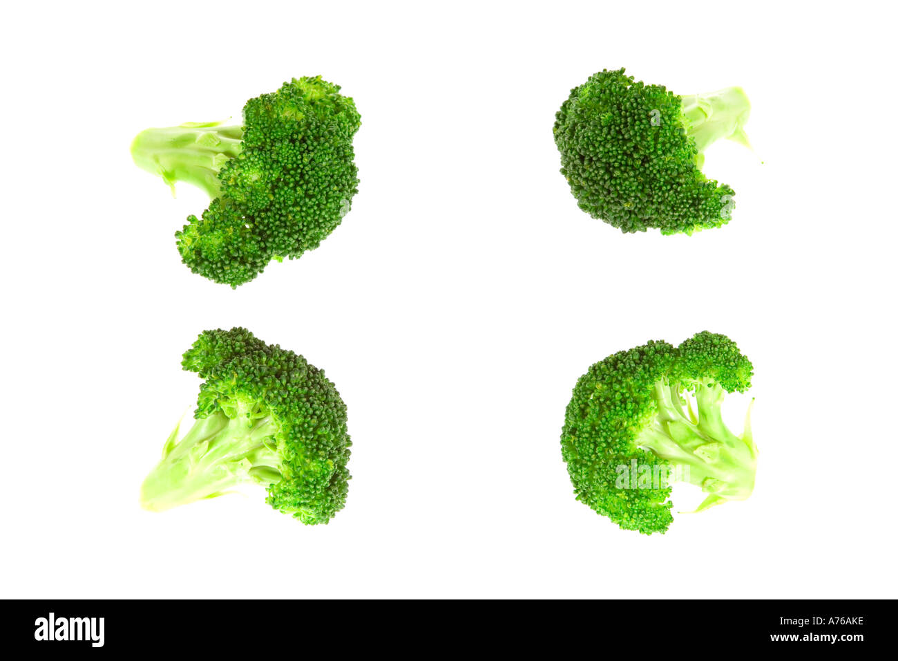 Four broccoli florets arranged on a pure white background Stock Photo