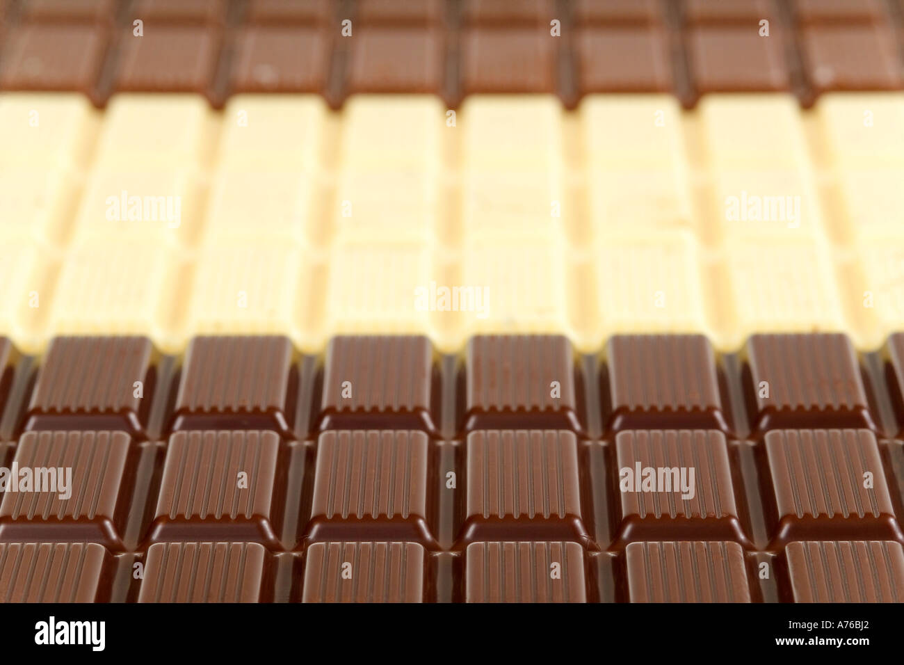 Close up macro of plain, white and milk chocolate bars Stock Photo Alamy — free download