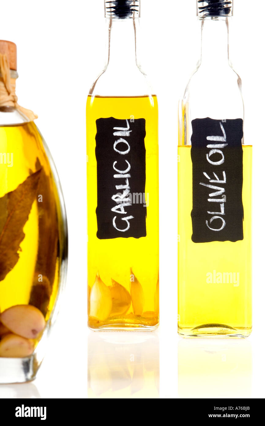 Flavoured olive oil bottles on a pure white background Stock Photo Alamy