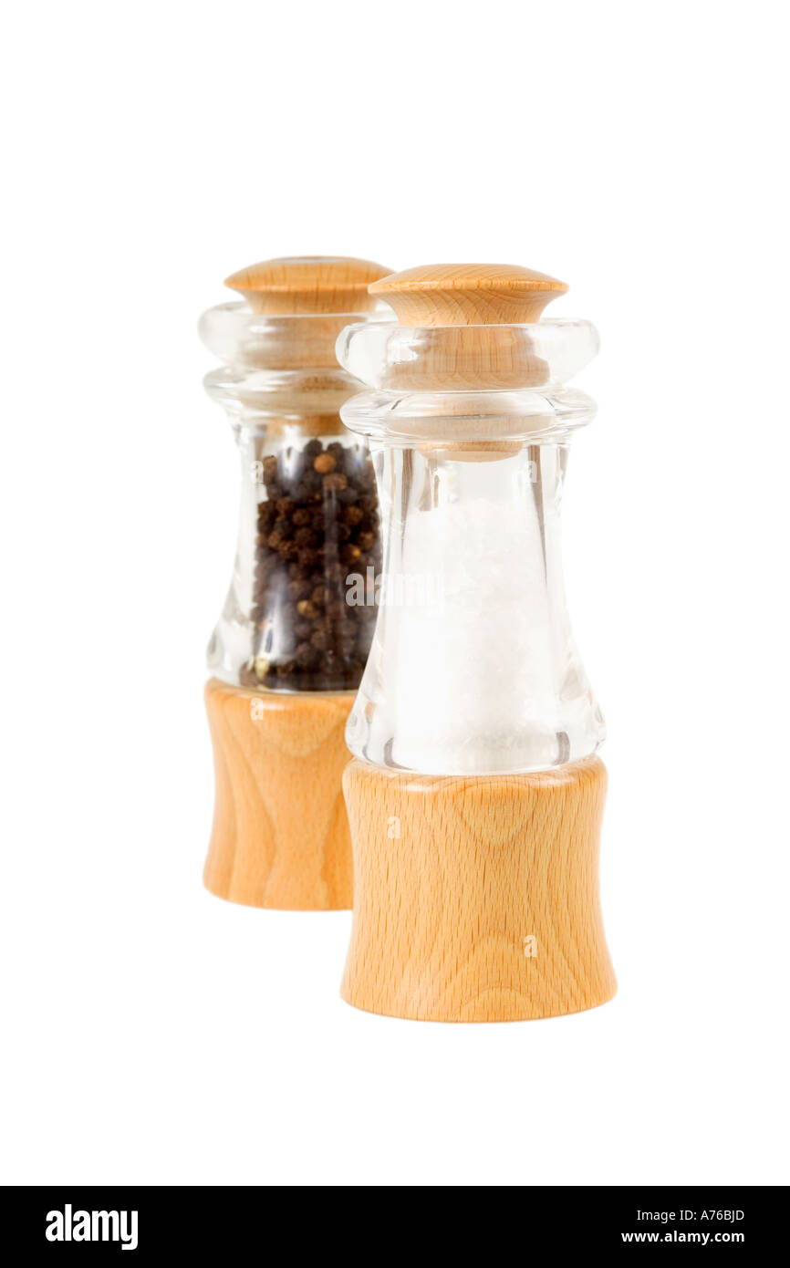 Wooden and clear plastic salt and pepper mills on a pure white