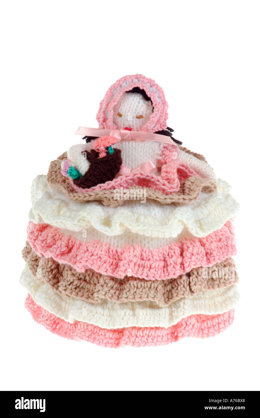 Kitsch knitted lady toilet roll cover on a pure white background Stock  Photo - Alamy