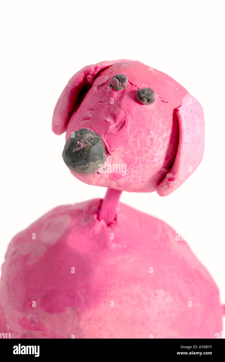 Pink Plasticine dog: A child's handcrafted creation Stock Photo