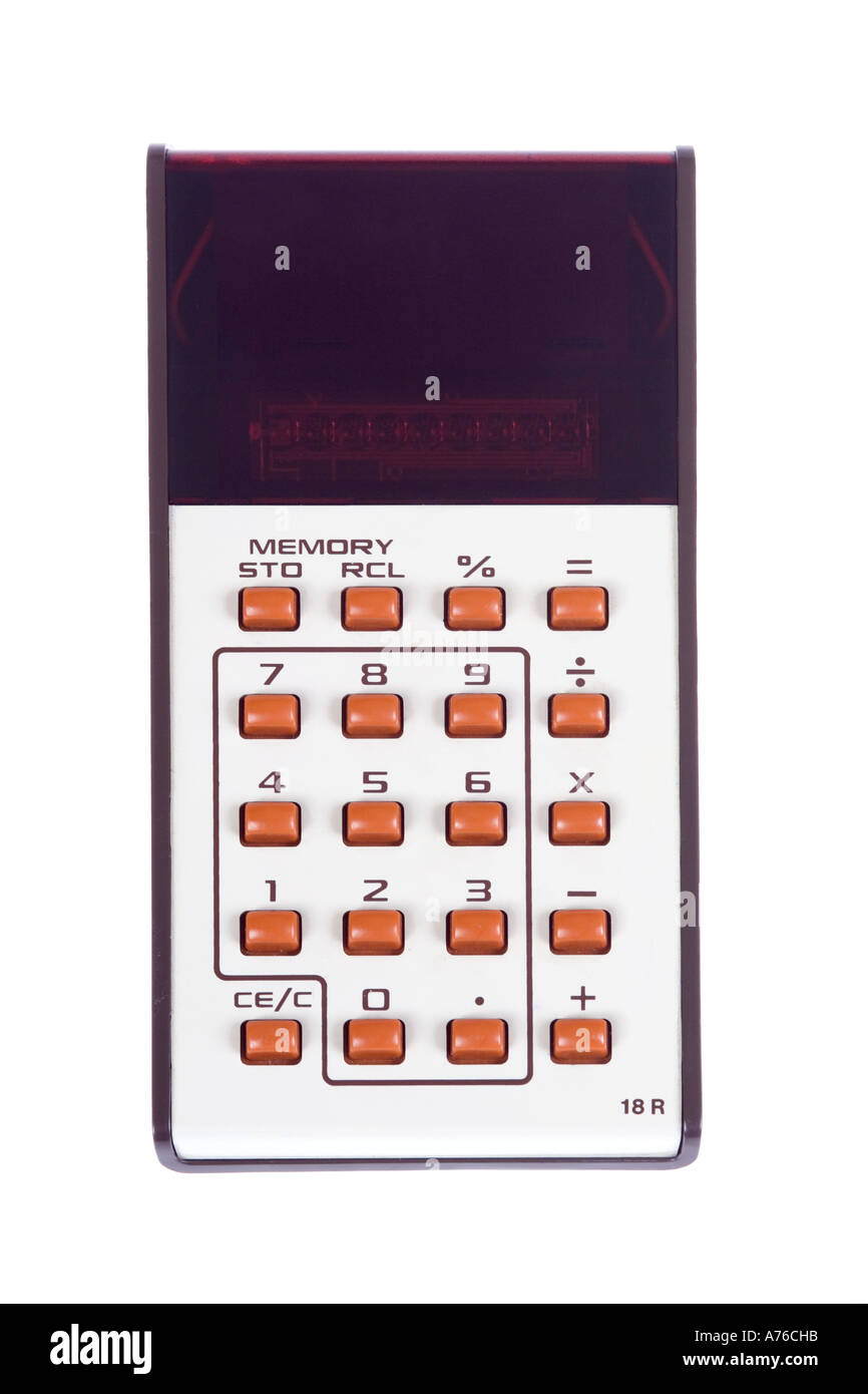 1970's early electronic handheld calculator on a pure white background. Stock Photo