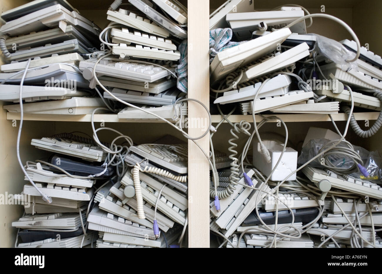 Computer keyboards awaiting recycling Stock Photo Alamy
