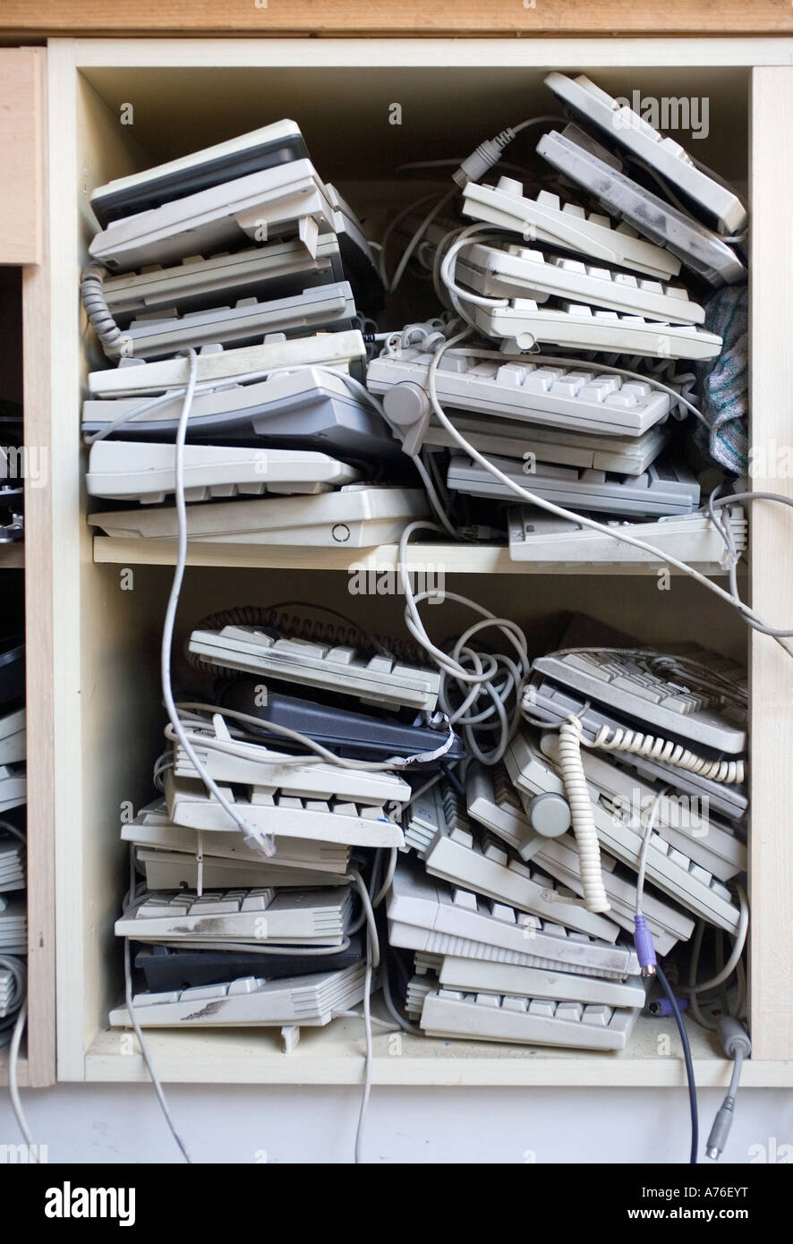 Computer keyboards awaiting recycling Stock Photo Alamy