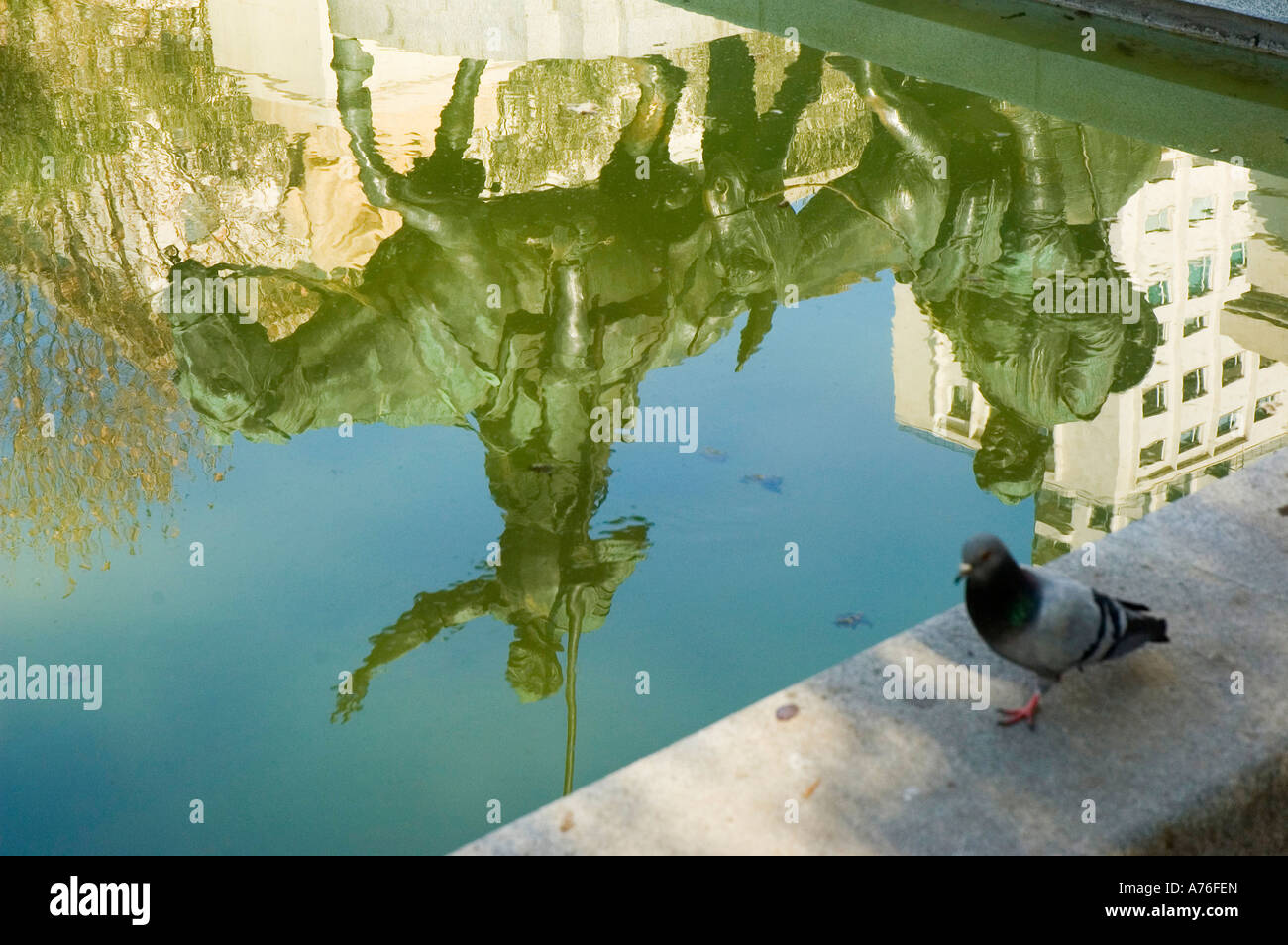 Don Quixote and Sancho Panza reflected on a pond Plaza de España MADRID Spain Stock Photo