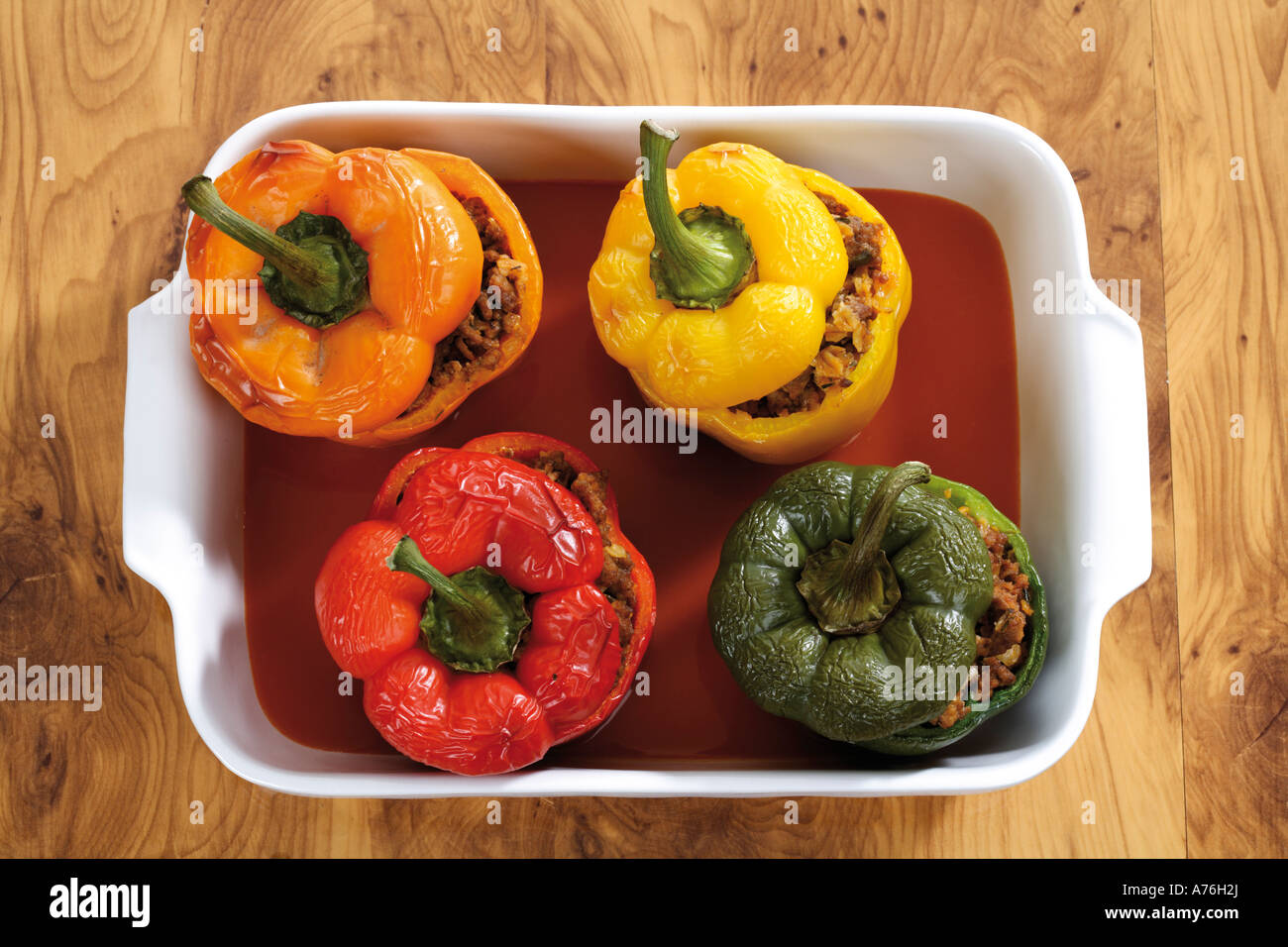Bell pepper filled with minced meat in tomato sauce Stock Photo Alamy