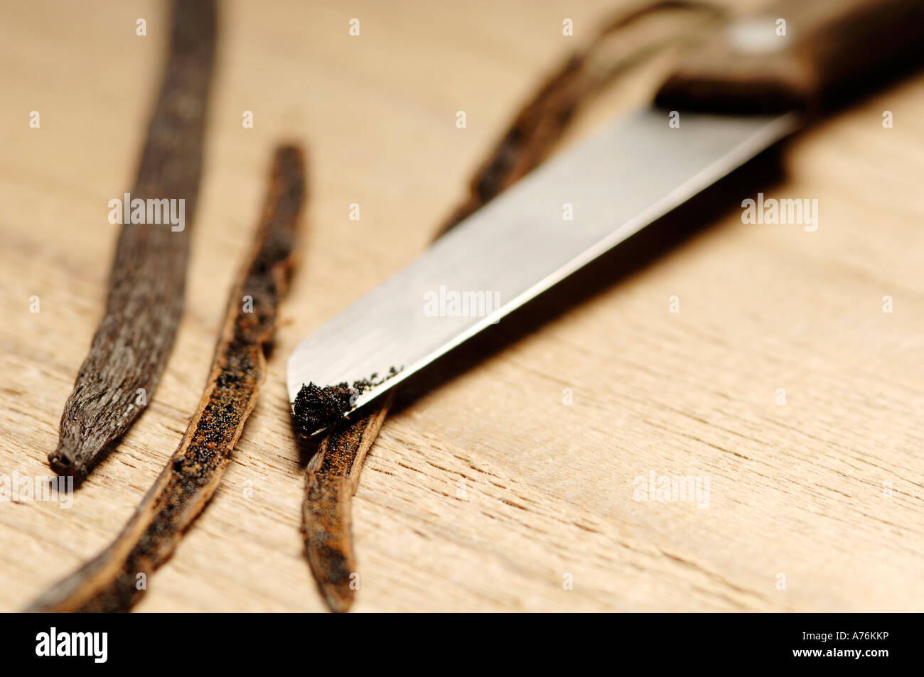 Vanilla bean and knife, closeup Stock Photo Alamy