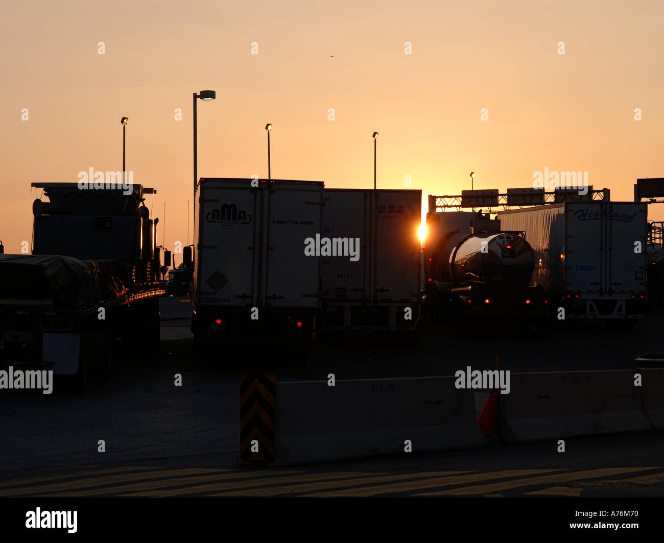 Trucks parked outside the Duty Free Shop in Sarnia ON Canada Sun is Trucks parked outside the Duty Free Shop in Sarnia ON Canada Sun is