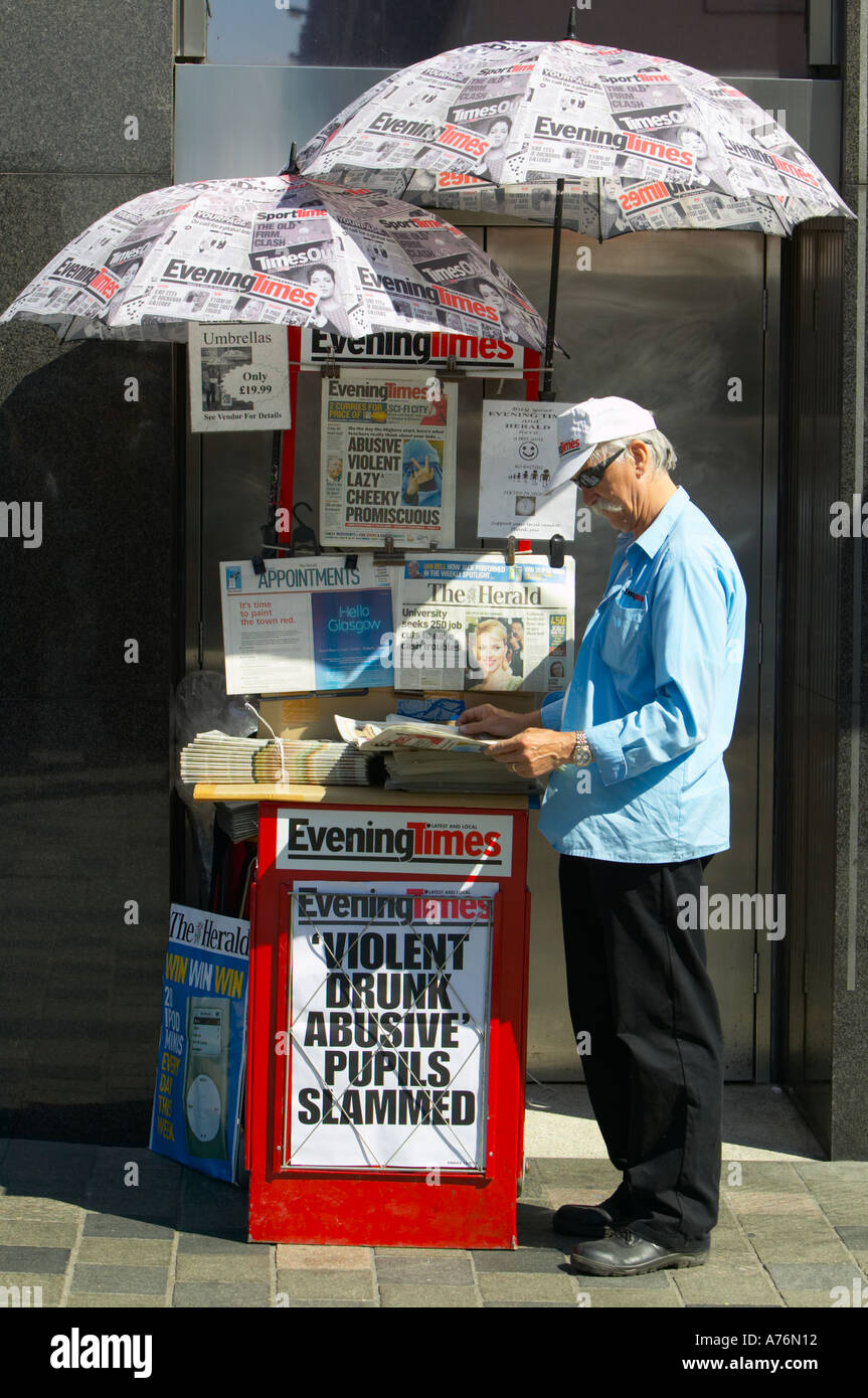 Scotland, Glasgow, Sauchiehall Street. Evening Times newspaper street  seller Stock Photo - Alamy