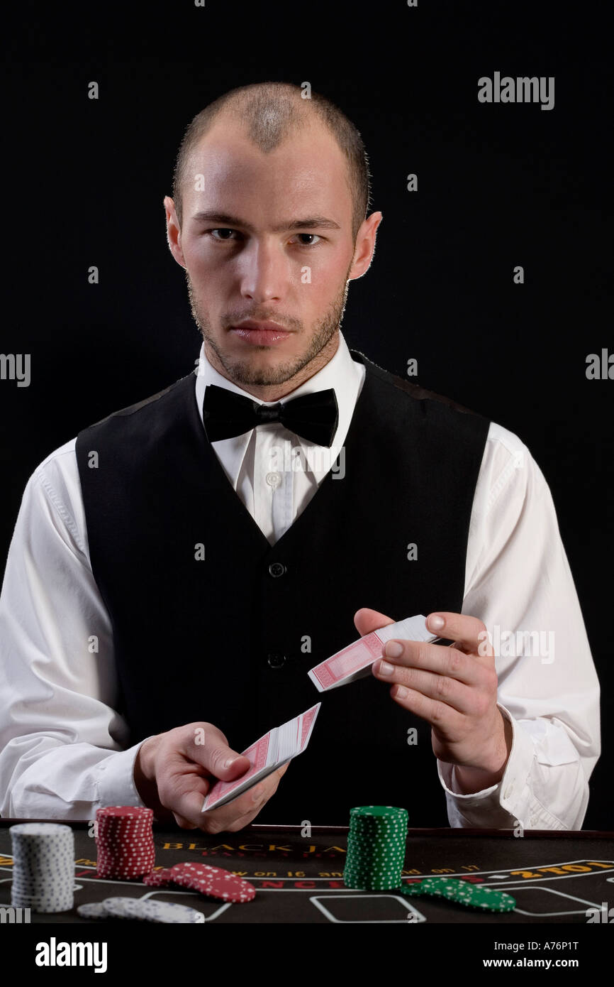 Man shuffling playing cards Stock Photo Alamy