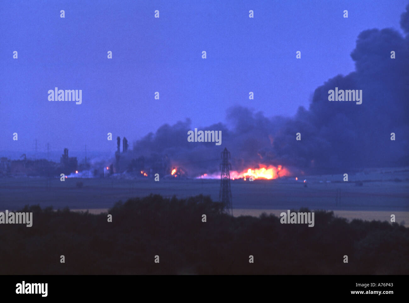 The scene in June 1974 the evening after the Flixborough disaster showing the Nypro works site still on fire Stock Photo
