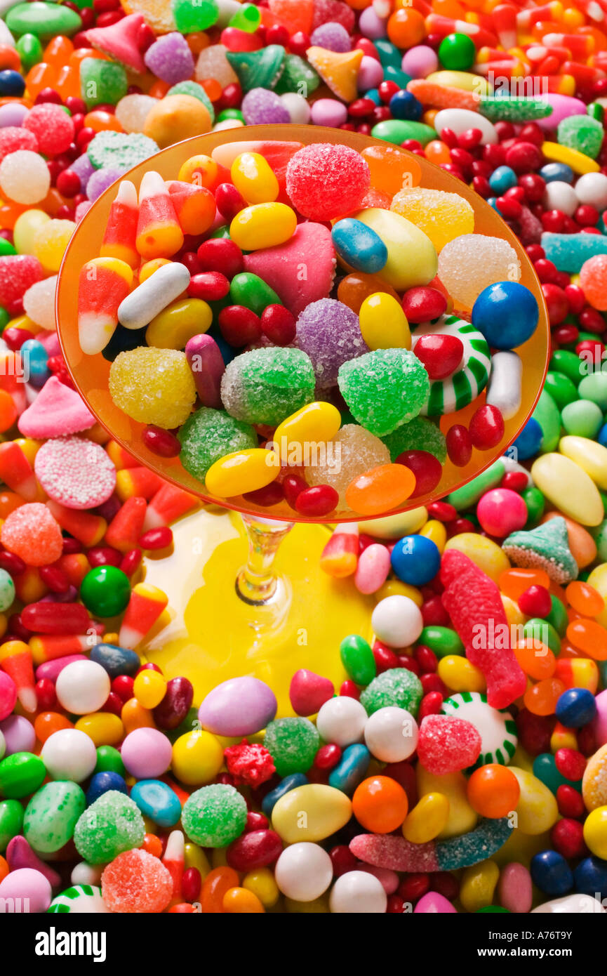 Glass with candy Stock Photo Alamy