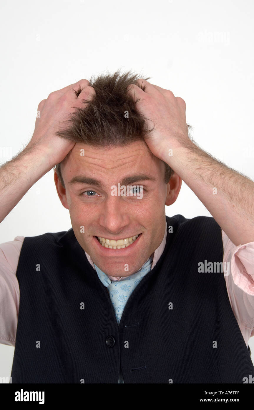 businessman tearing his hair out Stock Photo