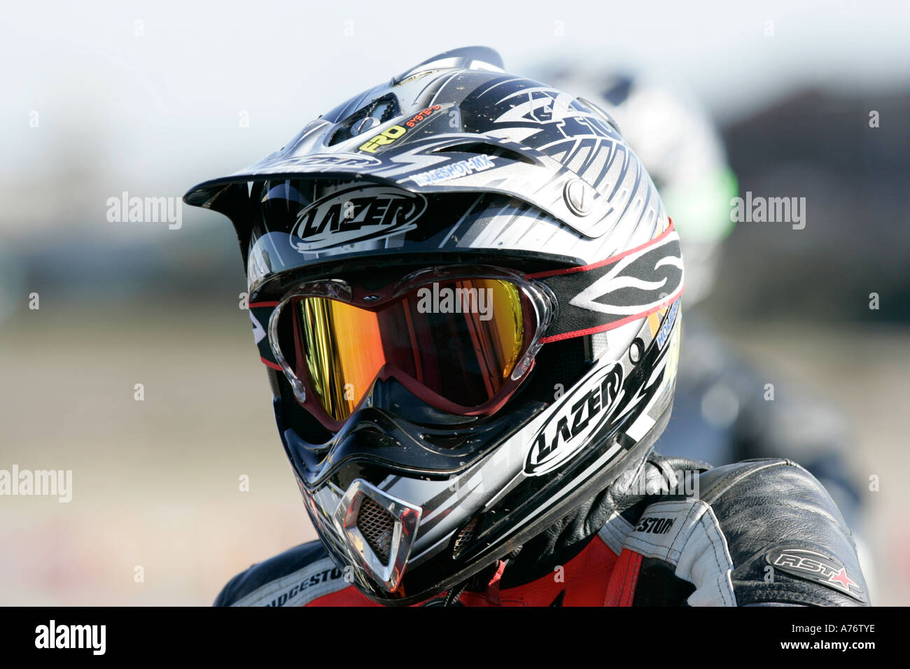 Motocross Rider In Helmet And Visor On The Grid Before Bike Race At Stock Photo Alamy
