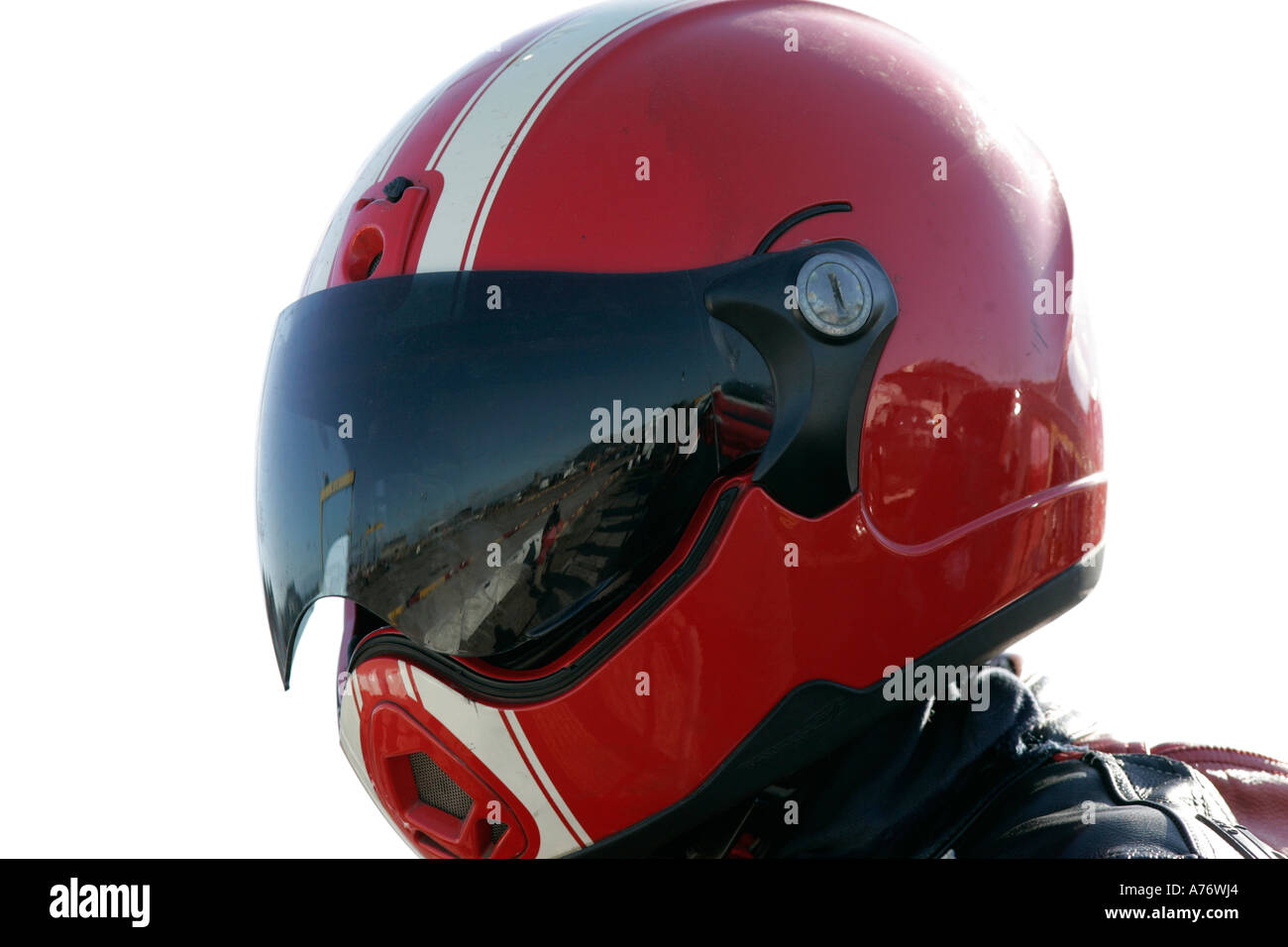 Bike rider with red helmet and reflective visor at the Motorcycle and