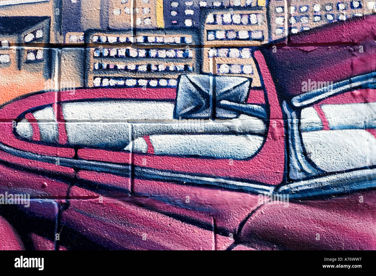 Wall painting pink convertable car street art graffiti marketing Stock