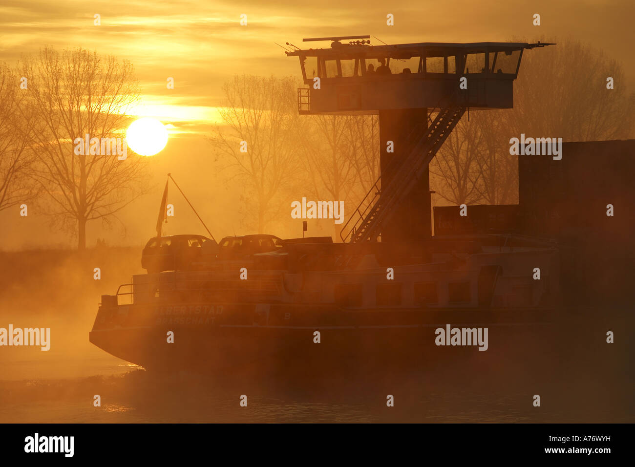 Freight ship on the Rhine near Worms, Rhineland-Palatinate, Germany Stock Photo