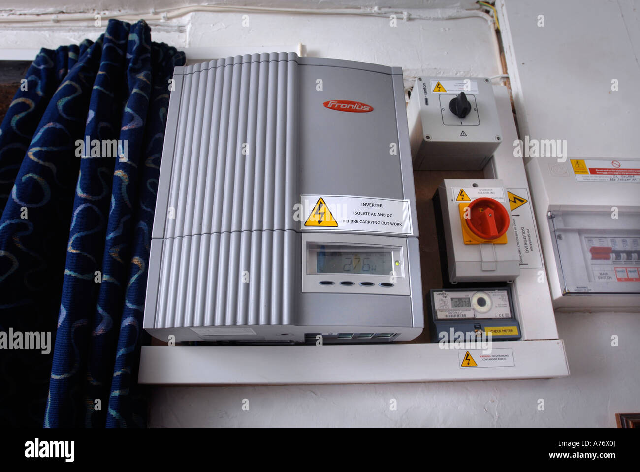 A POWER INVERTER CONTROL BOX IN A HOME WITH SOLAR POWER Stock Photo