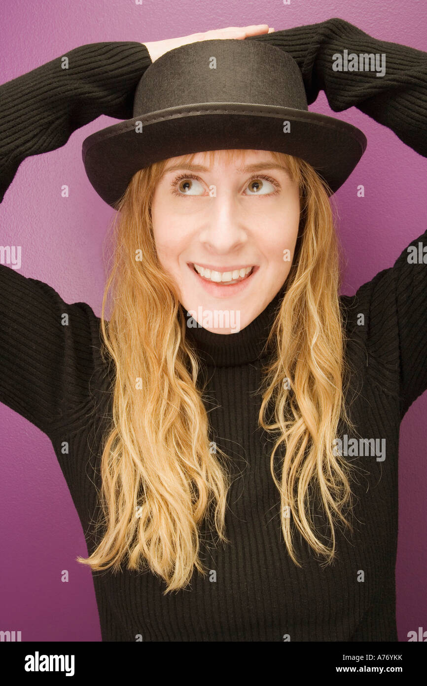 Young lady wearing bowler hat hi-res stock photography and images - Alamy