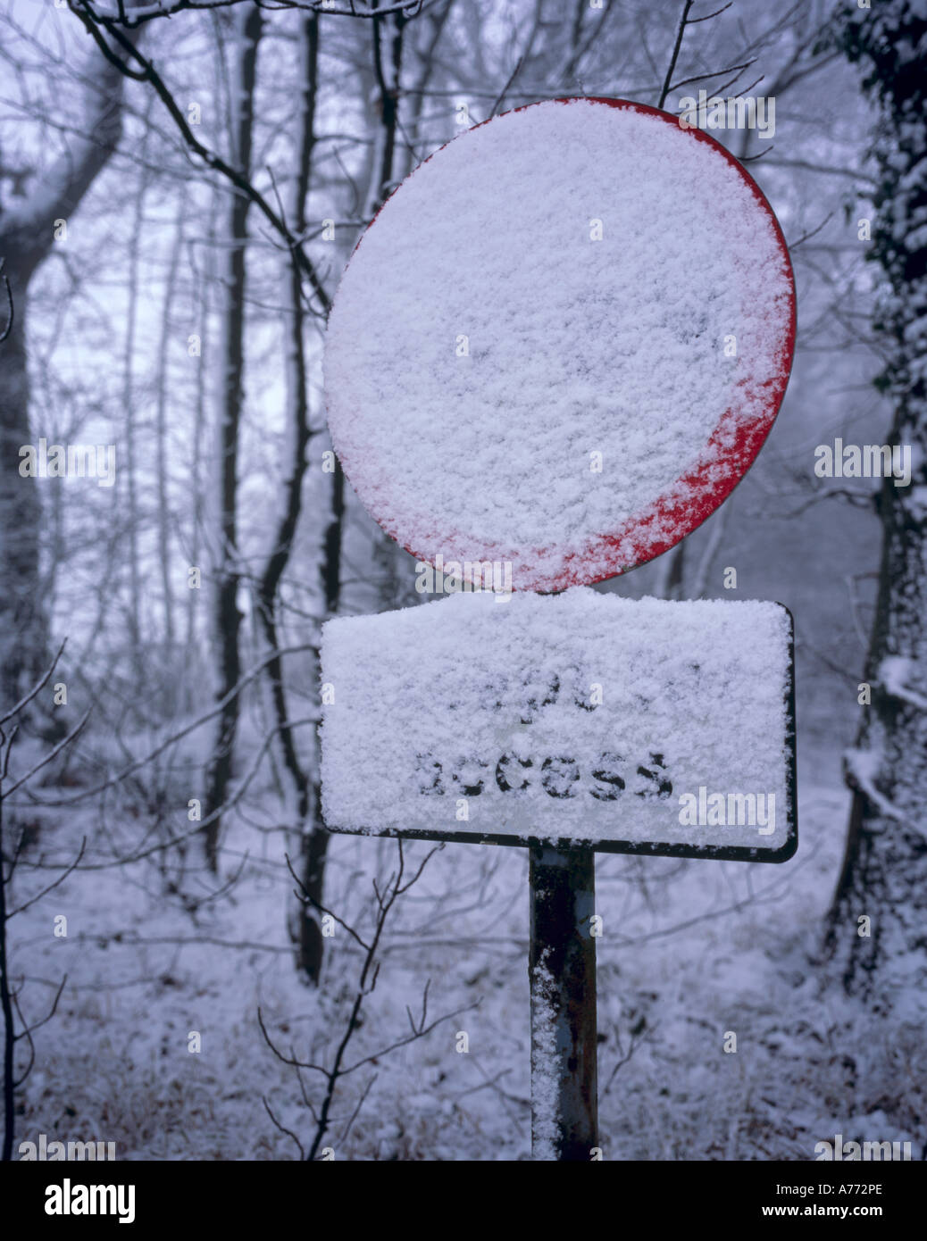 Width restriction road sign covered in fresh snow. Kent, England, UK Stock Photo