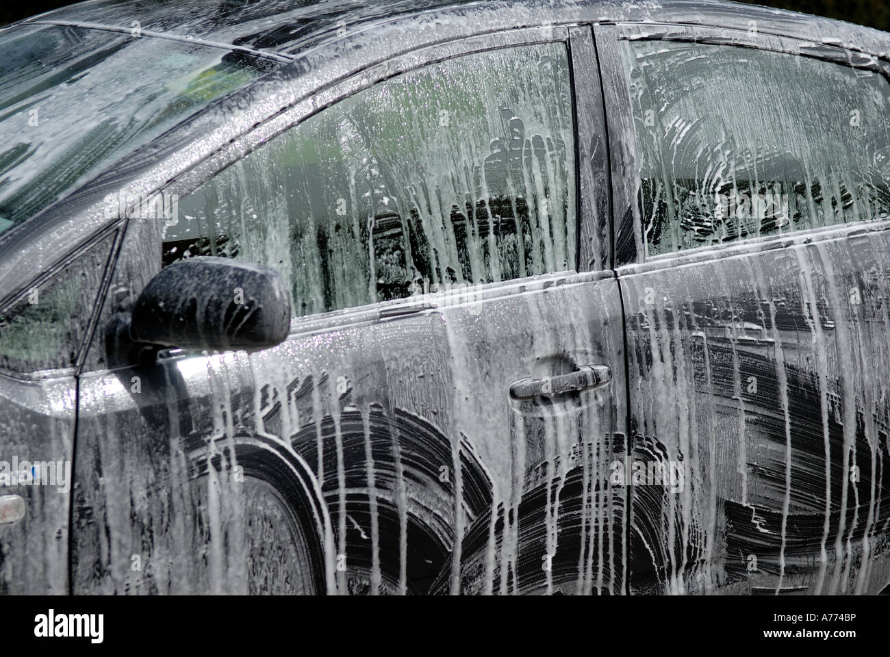 Car covered in soap suds Stock Photo Alamy