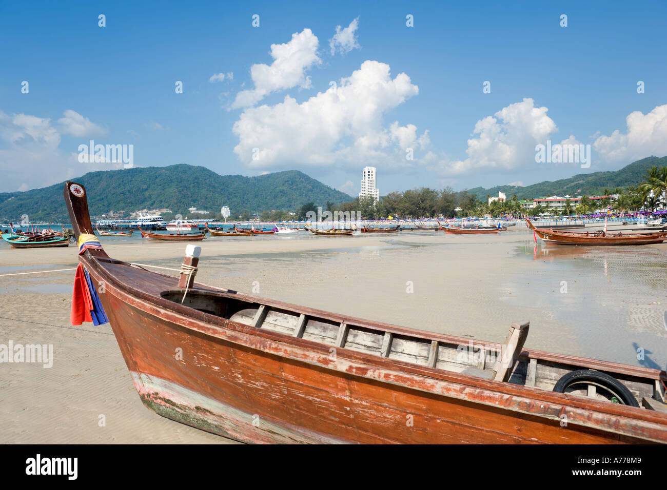 Local fishing boats on Patong Beach, Phuket, Thailand Stock Photo