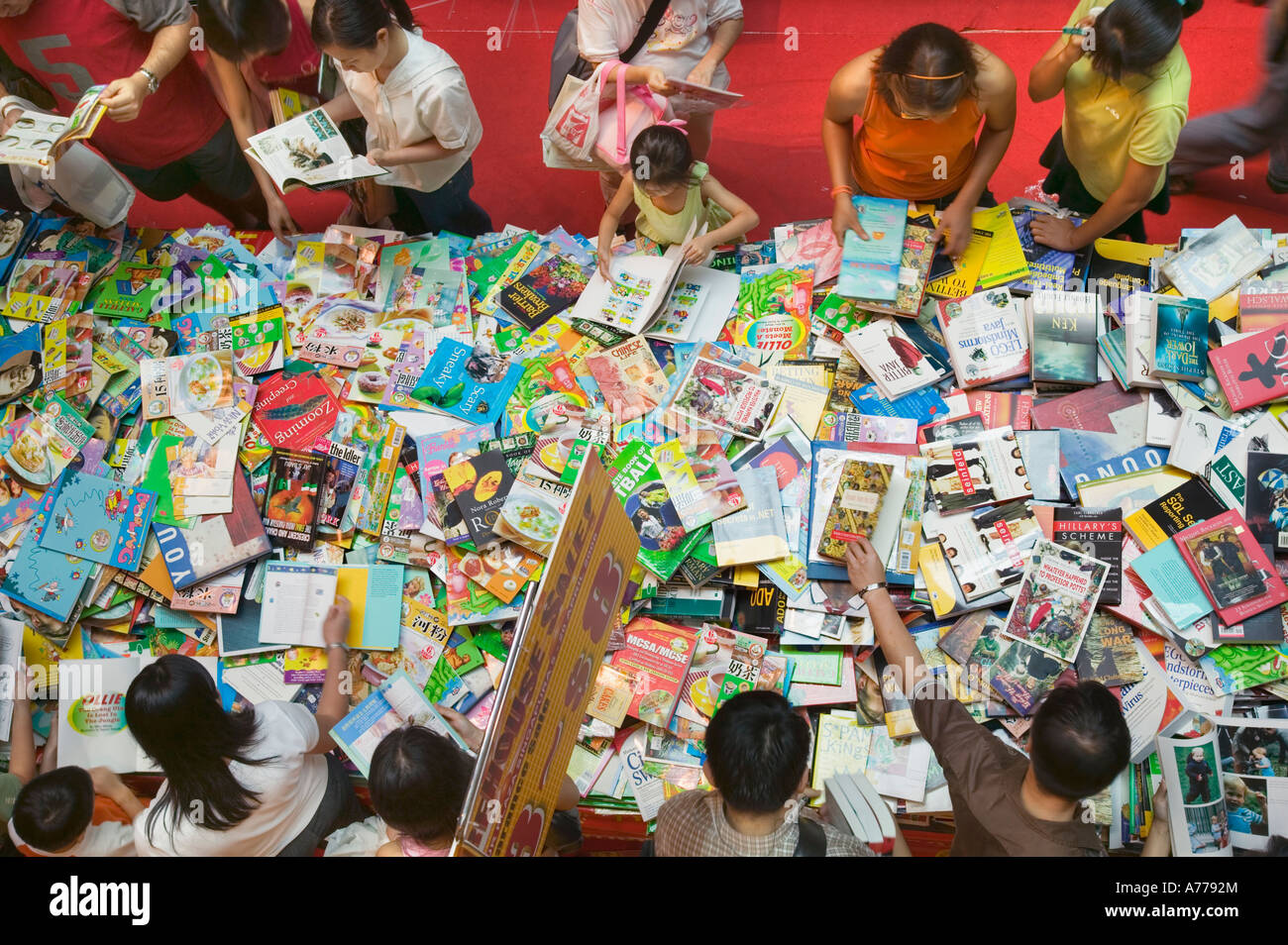 Shopping for books in an Orchard Road shopping mall, Singapore. Stock Photo