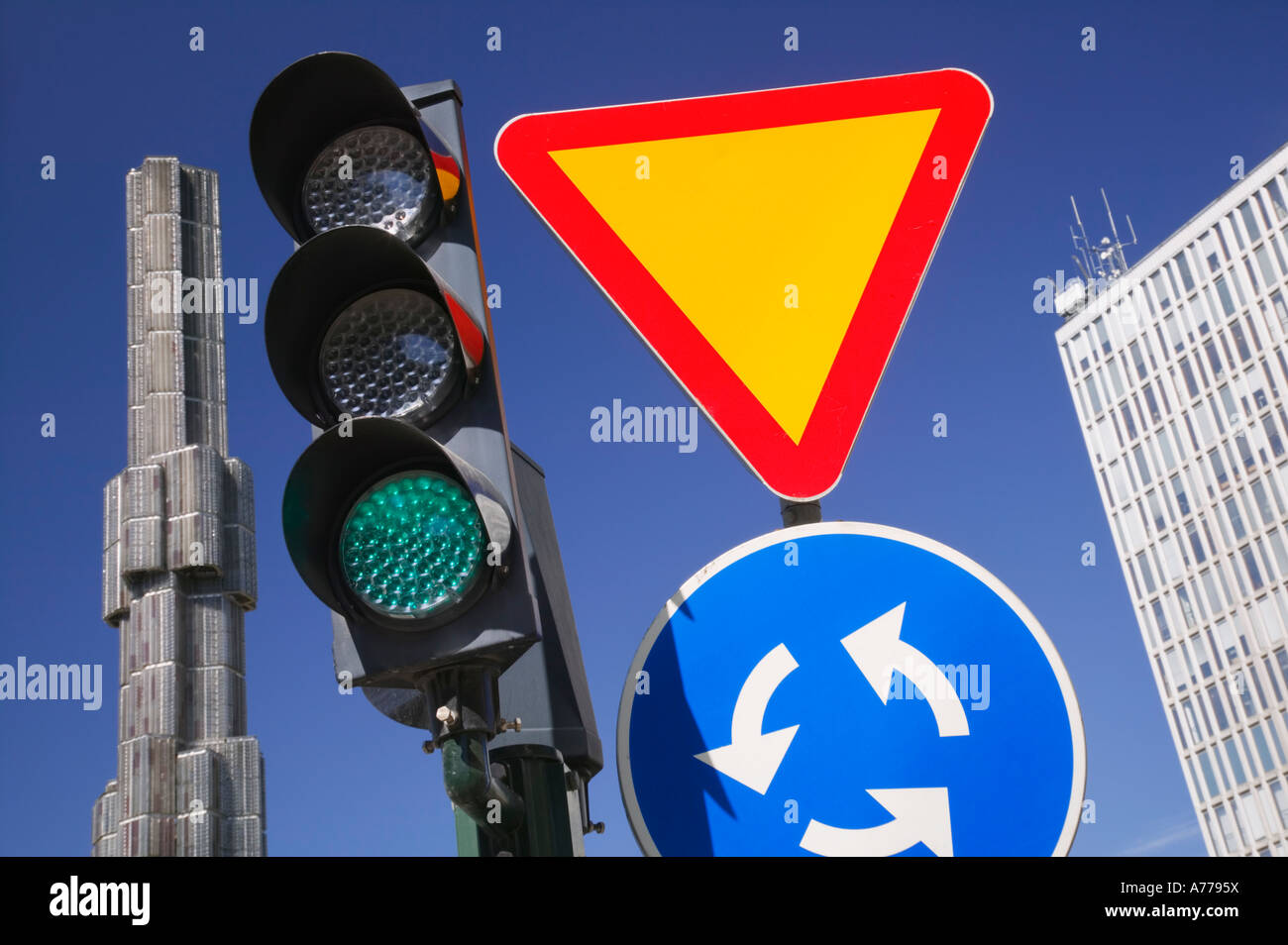 Traffic signal and signs in Sergels Torg, Sweden. Stock Photo