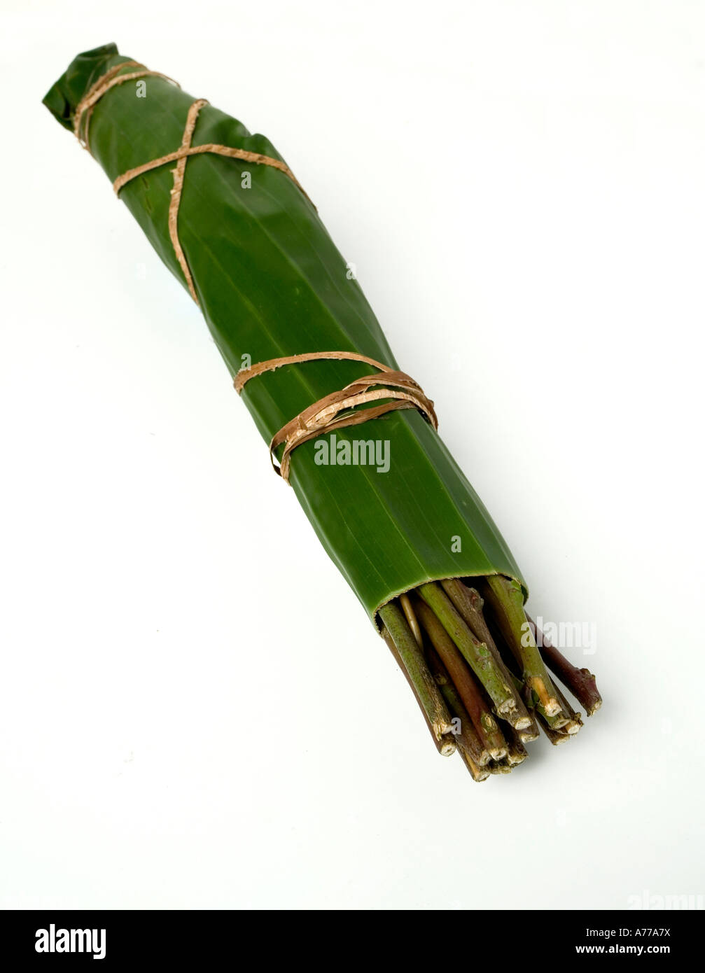 A wrapped bunch of Khat or Qat or Gat. Legally sold for £5 GBP or $10 US a bunch in the UK. Stock Photo