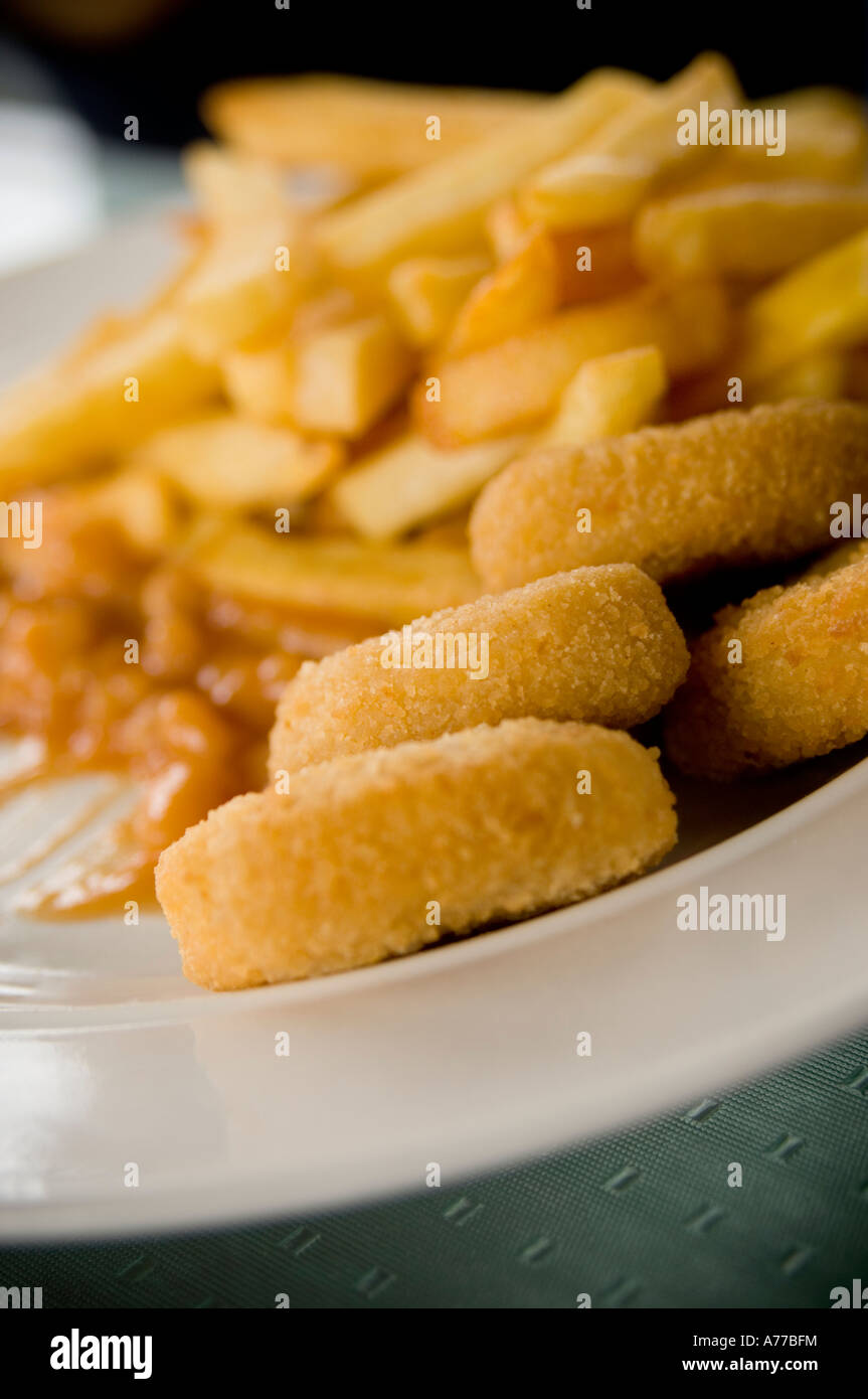 Plate of chicken nuggets chips and beans fatty junk food UK Stock Photo Alamy