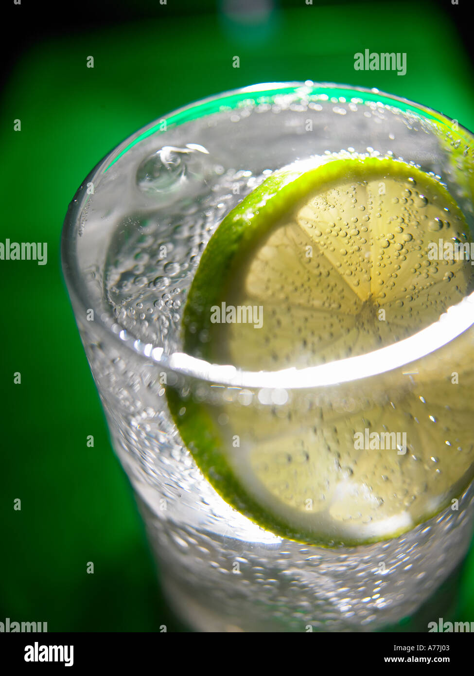 gin and tonic with ice and a slice Stock Photo Alamy