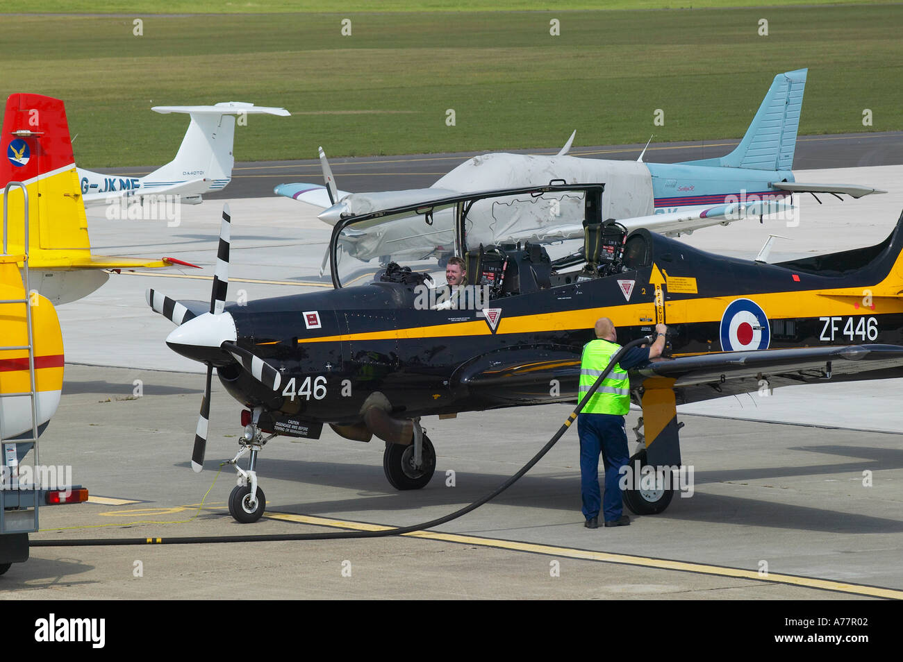 View of Tucano single engine turbo prop refuelling at Shoreham Airport, West Sussex Stock Photo