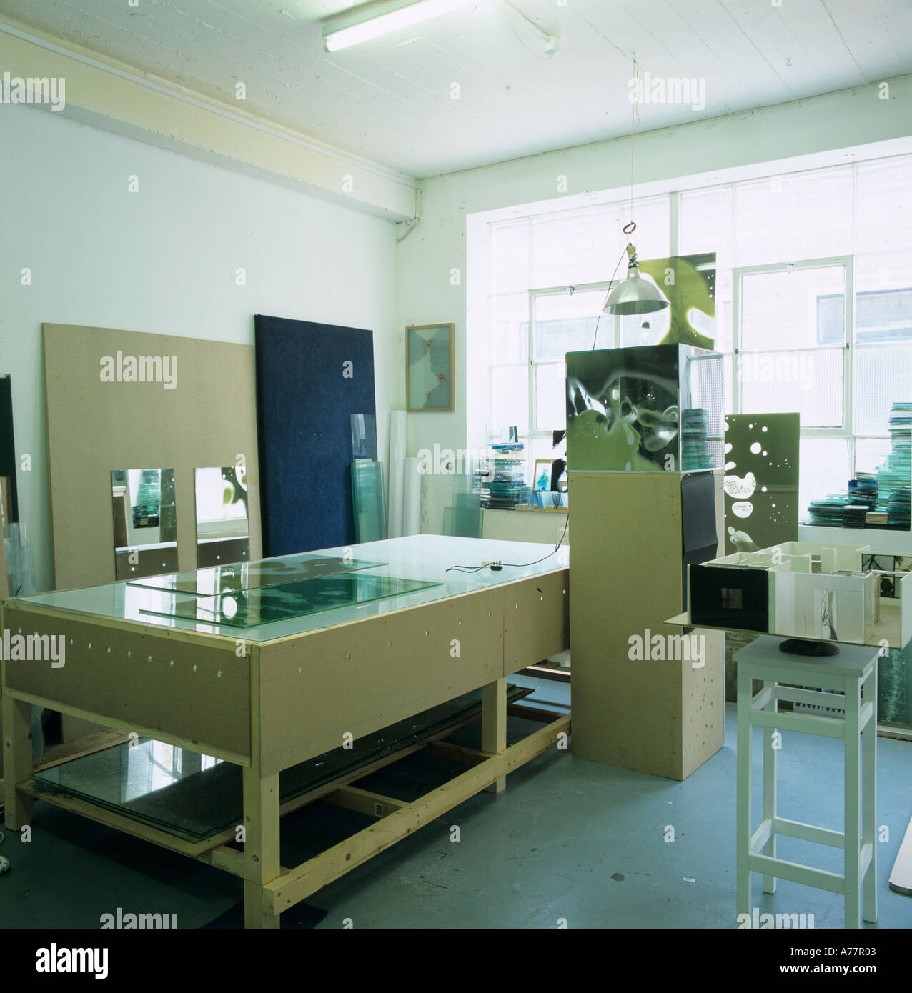 Stained glass designer craftsman s craftswoman s studio with work in