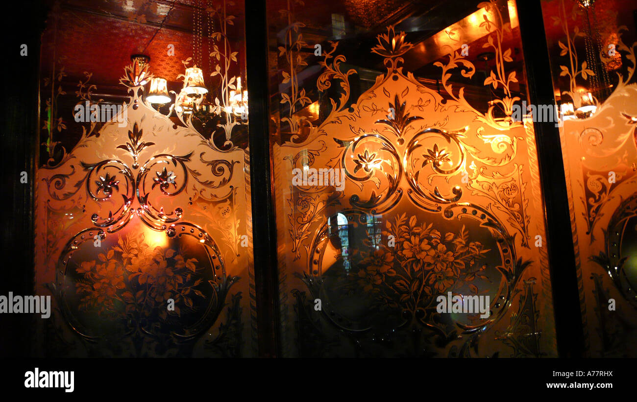 The etched glass windows of The Salisbury pub in St Martins Lane near Covent Garden in London Stock Photo