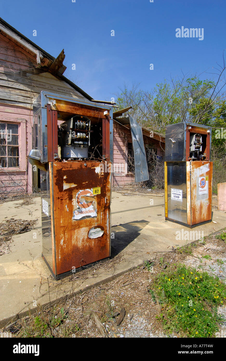 Old run down gas station with rusted pumps on the road from Selma to