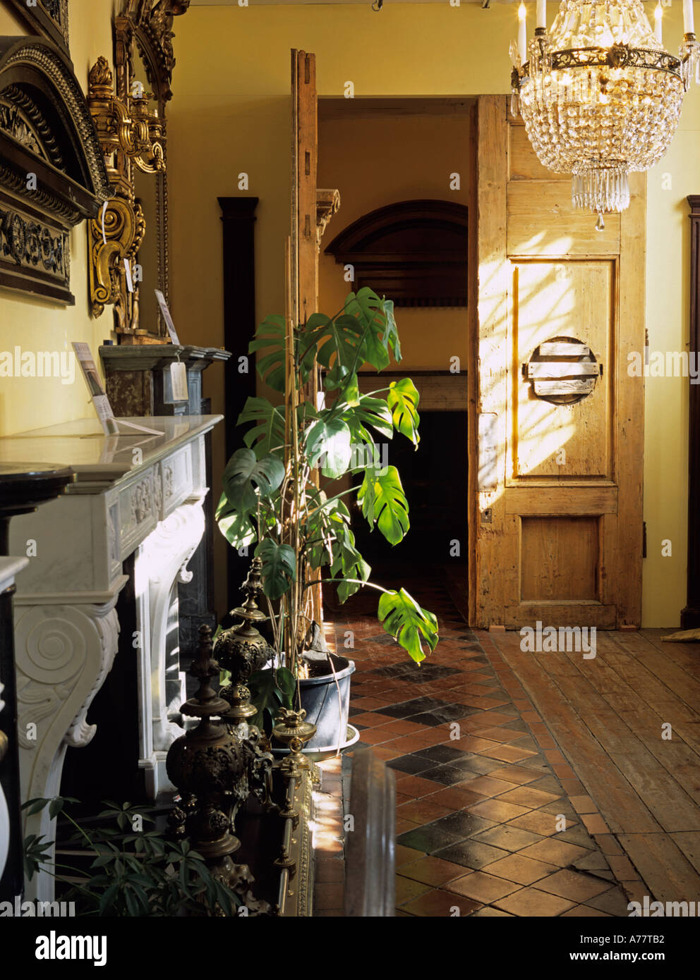 Room With Marble Fireplace Tiled Floor Double Wooden Doors And