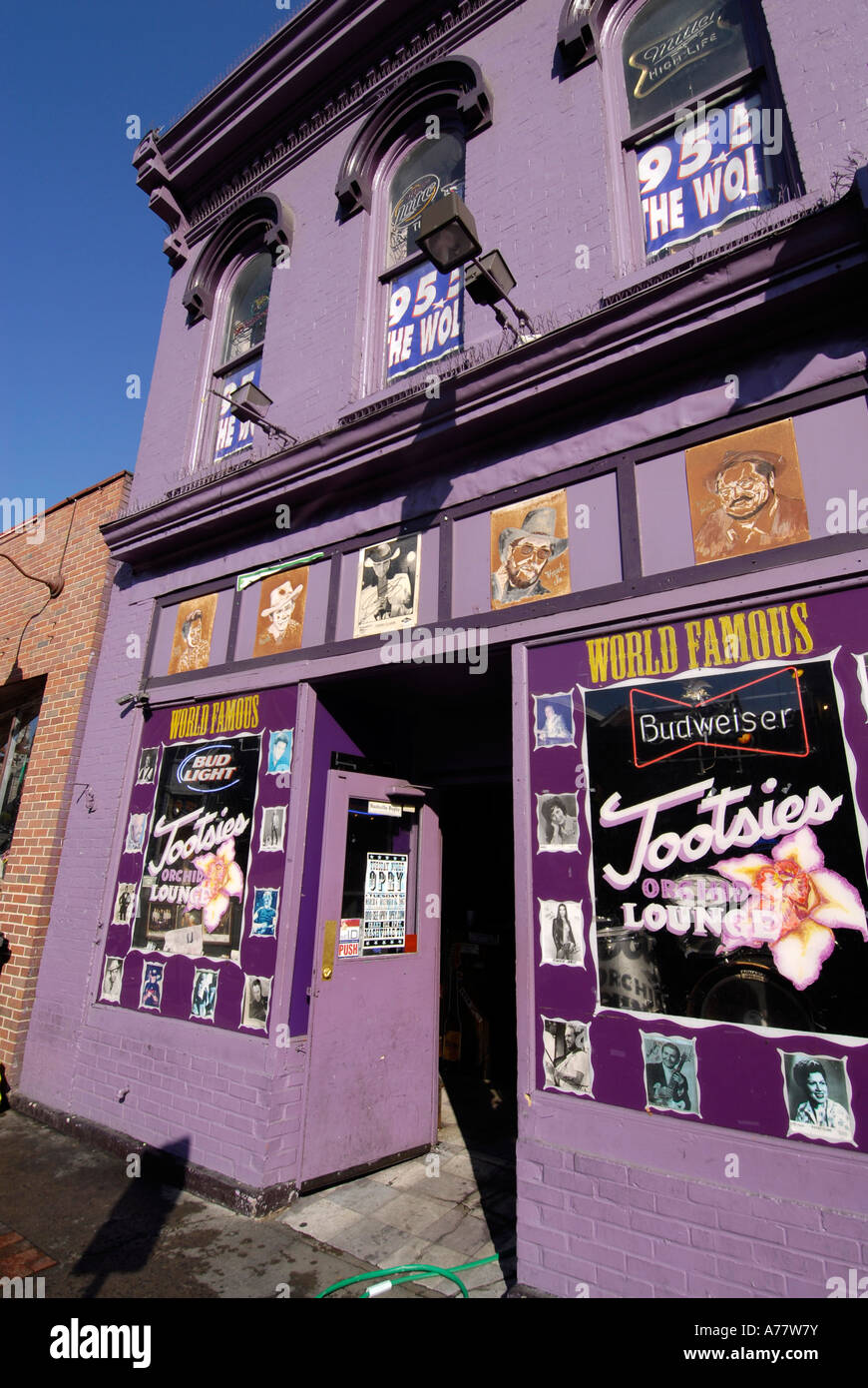 Tootsies famous bar with Signs and Markers along Broadway Street in