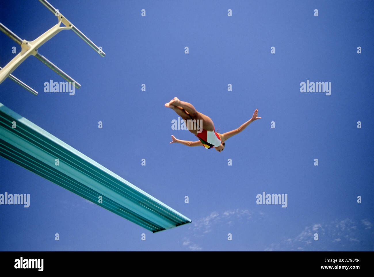 People jump from diving platform hires stock photography and images