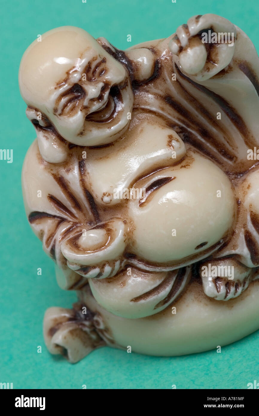 Carved ivory Buddha Stock Photo
