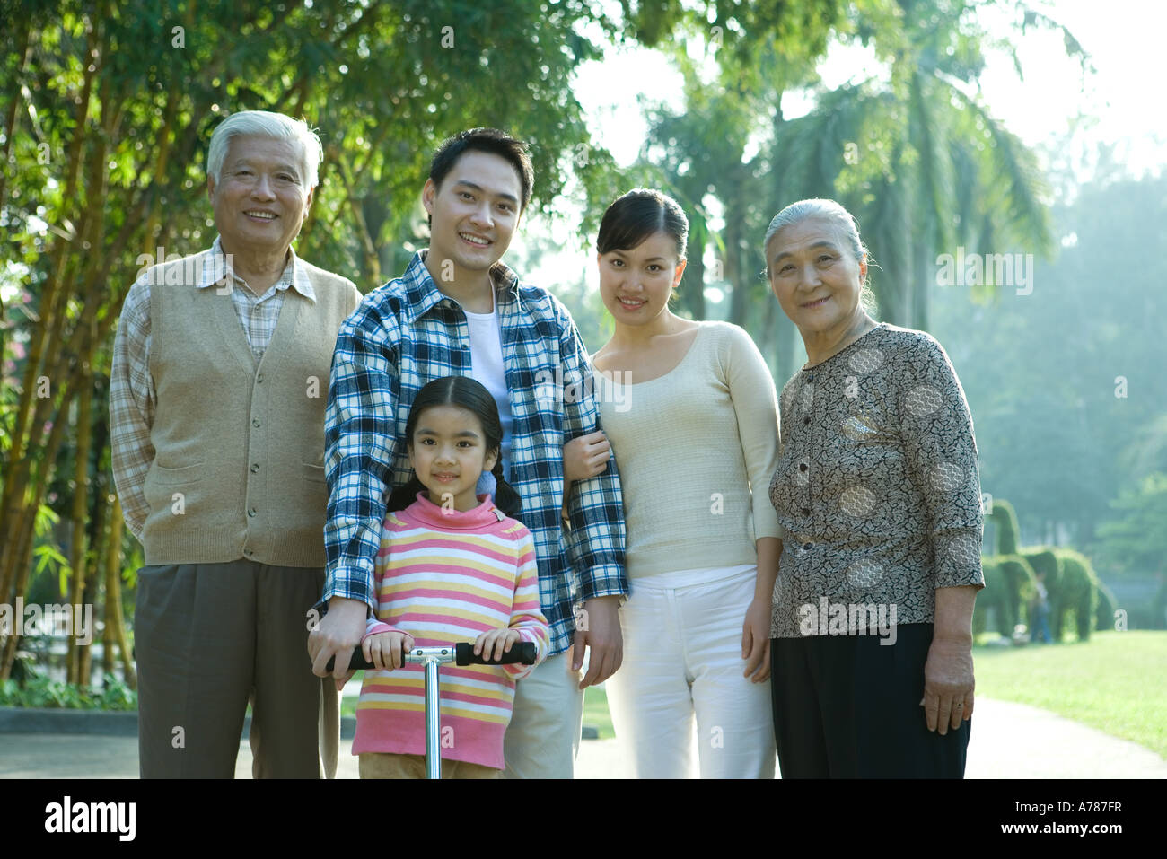 Three generation family in park, portrait Stock Photo