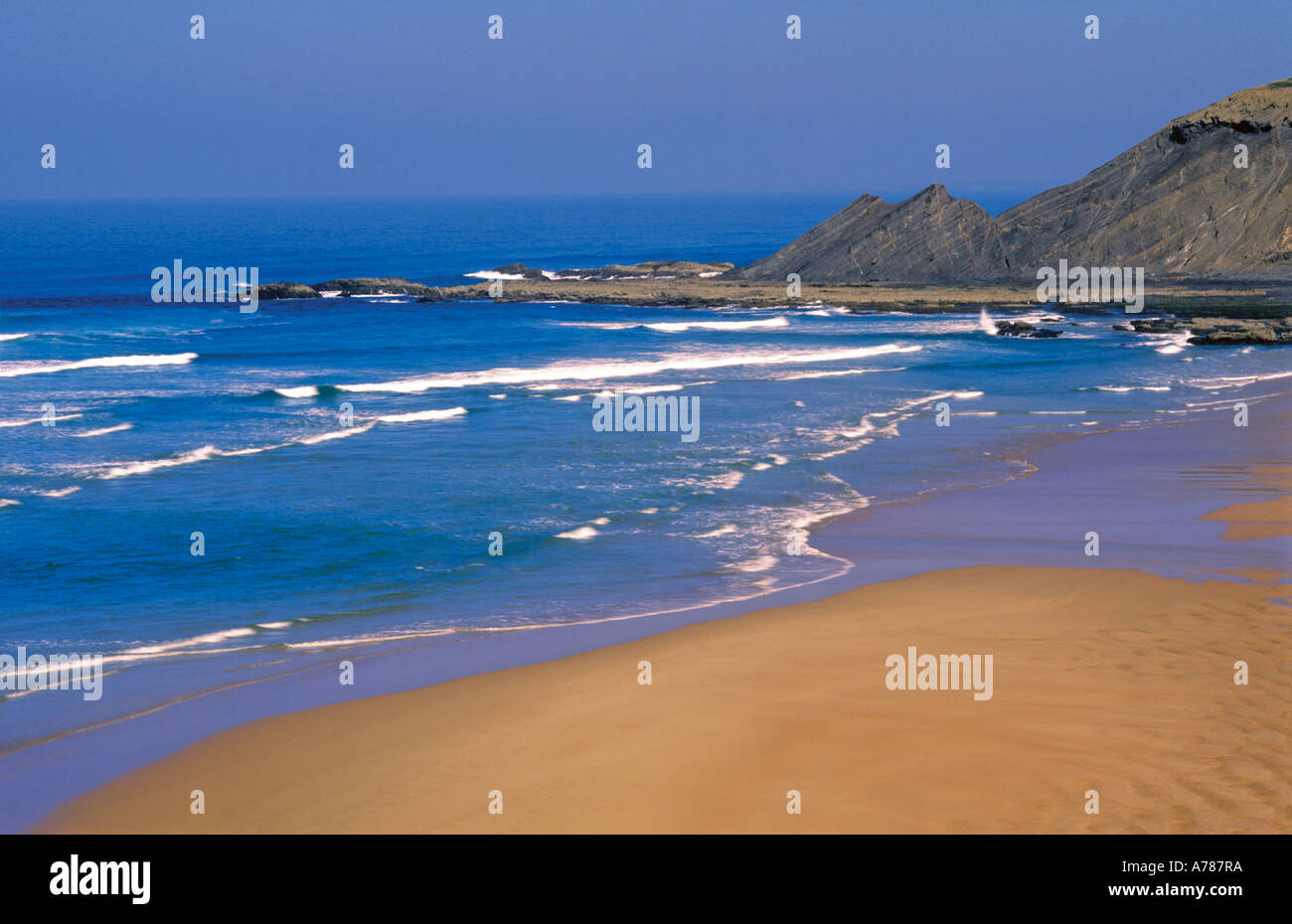 Sand waves and cliffs of the beach Praia da Amoreira Aljezur Natural Park  Costa Vicentina Algarve Portugal Stock Photo - Alamy