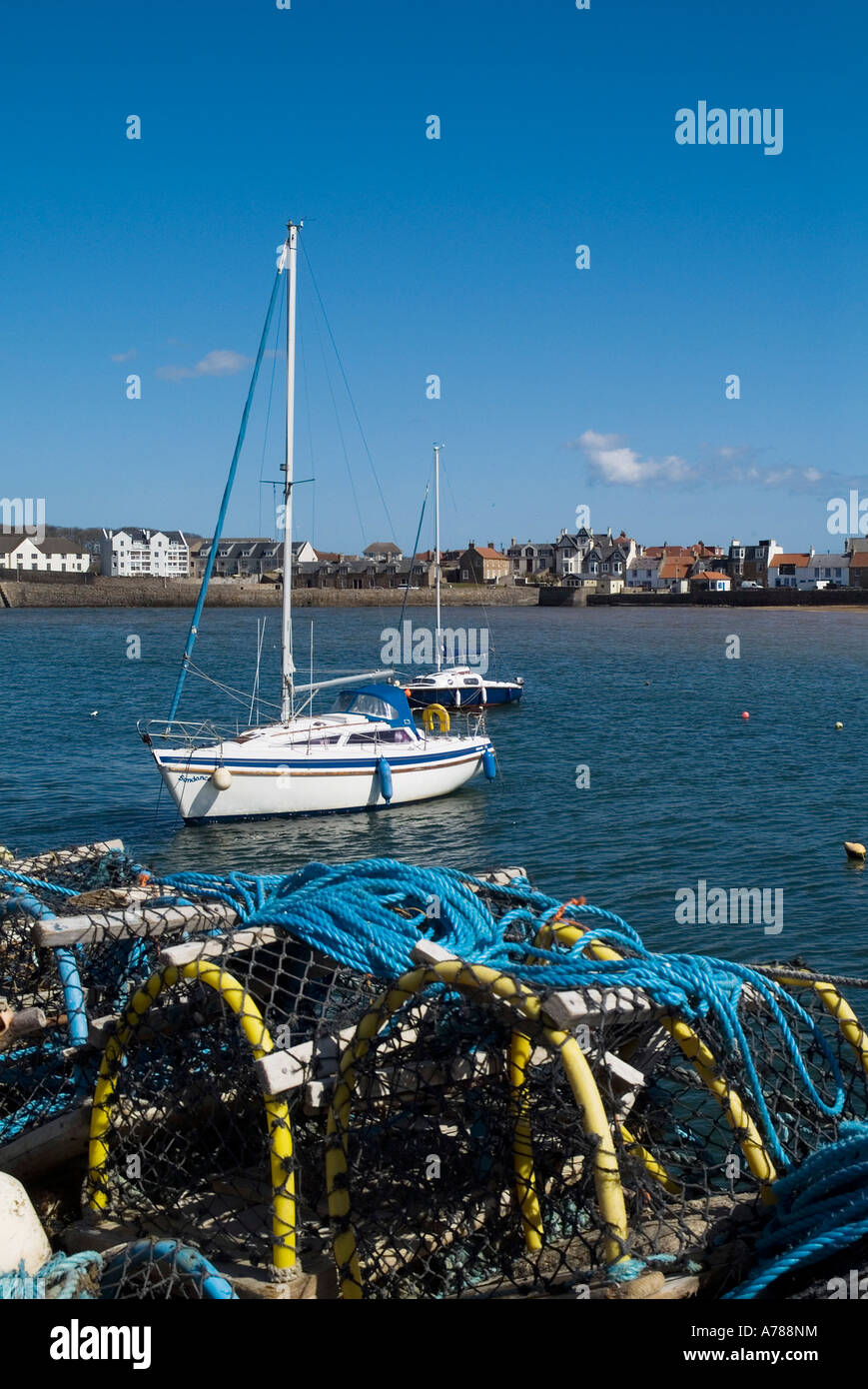dh Harbour ELIE FIFE Crab lobster creels and yachts anchored in bay Stock Photo