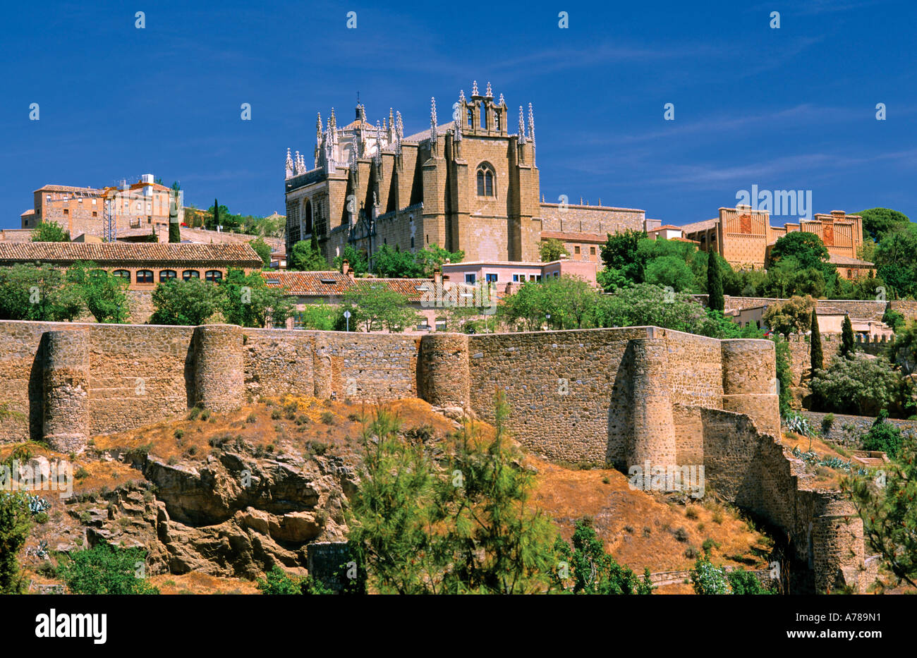 Cathedral and castle walls Toledo Castilla La Mancha Spain Europe Stock Photo