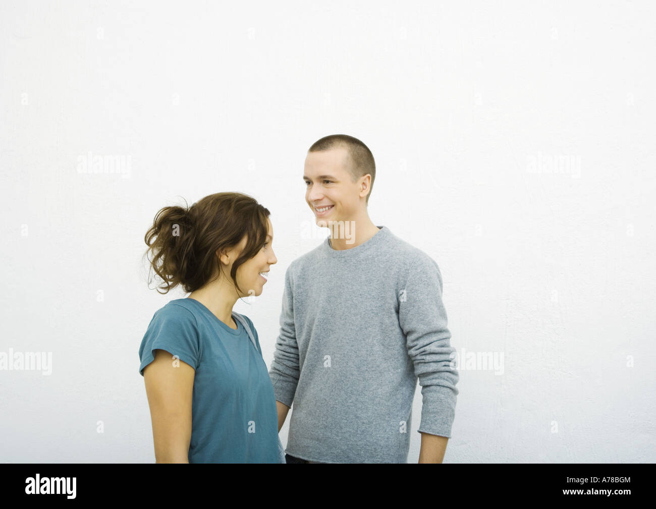 Couple looking in opposite directions hires stock photography and