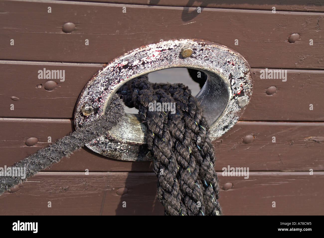 Detail Boat anchor rope hole Stock Photo - Alamy