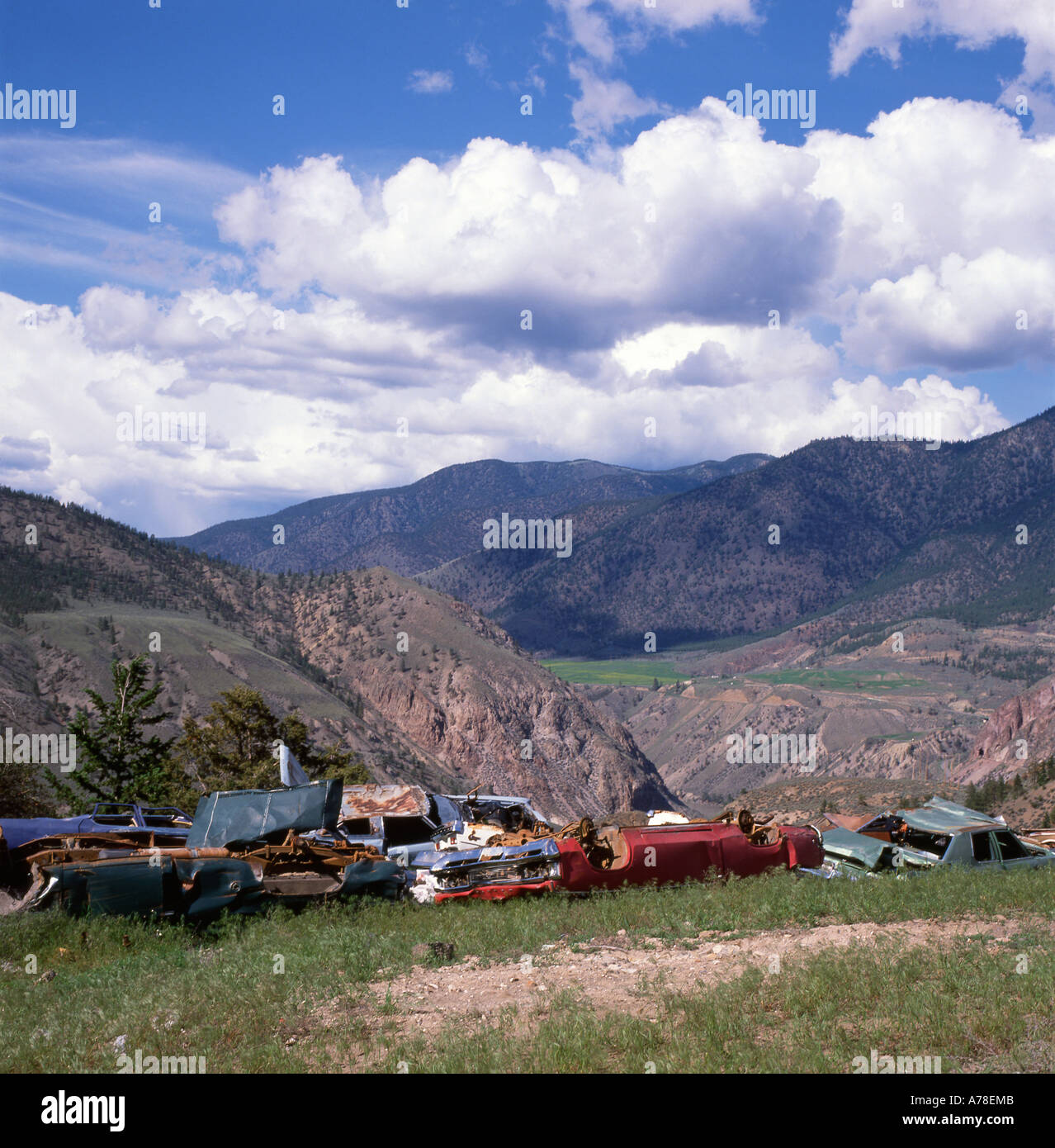 View of pile of cars on dump dumped in the remote mountainous landscape