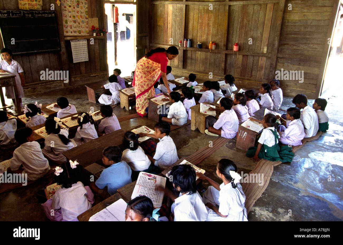 India Andaman Islands Havelock Number Three village education Secondary School junior class with female teacher Stock Photo